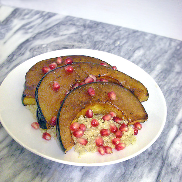 balsamic-maple roasted acorn squash with pomegranate seeds